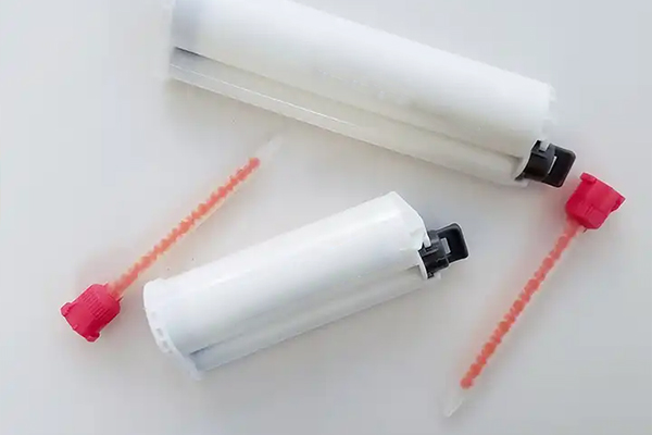 Solid surface adhesive and accessories